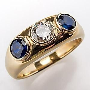 Bague vintage en or avec incrustation en verre bleu et zirconium