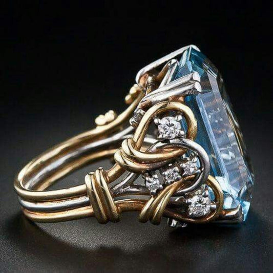 Bague vintage en or avec zircon bleu